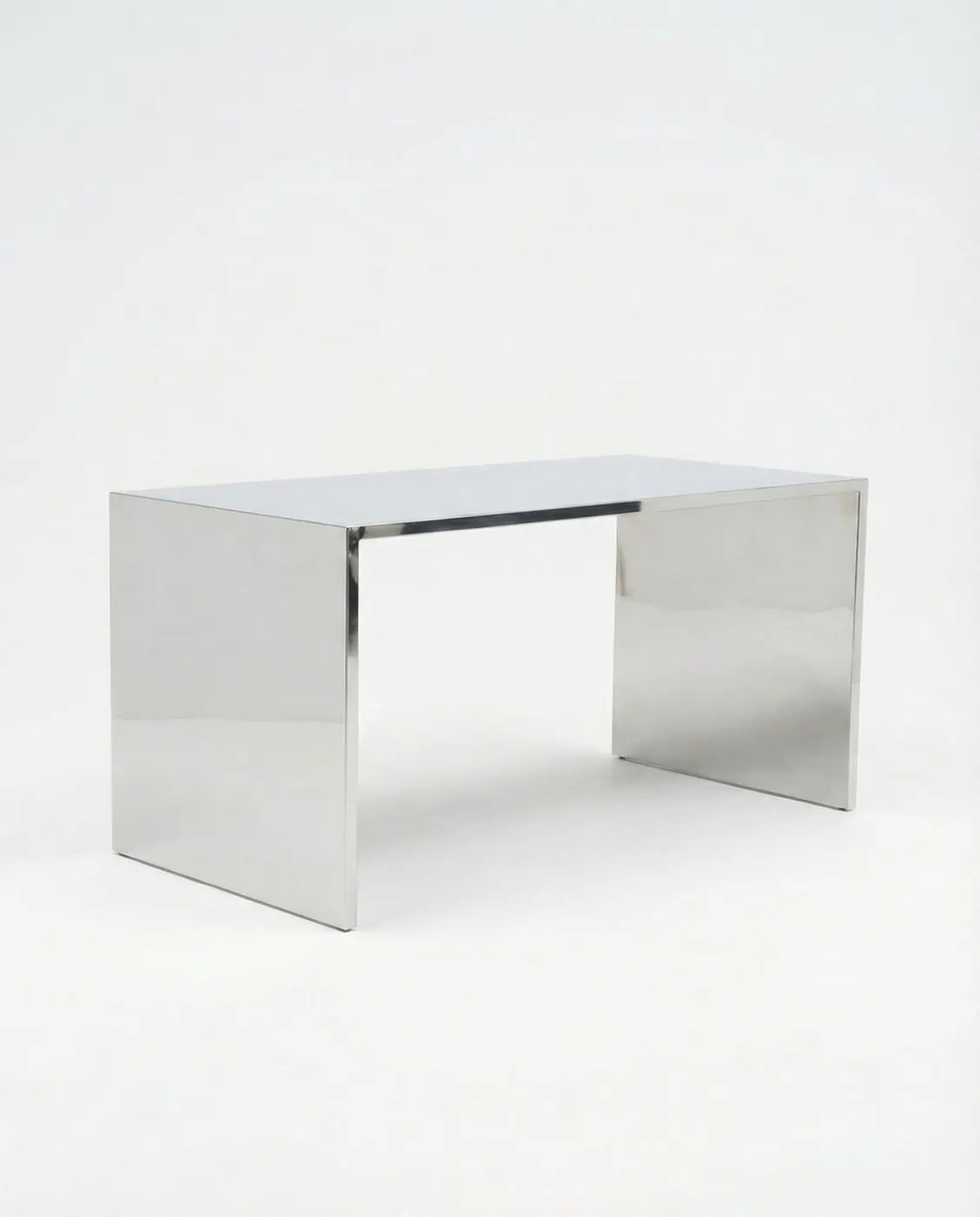 Chrome desk with reflective panels